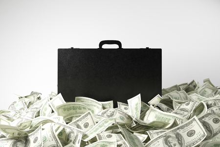 Heap of dollar banknotes around closed suitcase on white background. 3D Renderingの写真素材