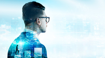 Financial growth concept with businessman thinking about profit on night Singapore city background with business chart and copy space. Double exposureの写真素材