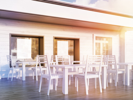 Restaurant yard view with posters in windows, tables and chairs on wooden floor. Concept of family business promotion. 3d rendering. Mock up. Toned imageの写真素材