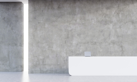 Reception desk in empty office with concrete walls and laptop on the table. Concept of apocalypse. 3d rendering, mockupの写真素材