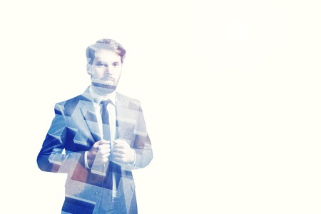 Portrait of a bearded businessman looking at you seriously. There is a gray labyrinth image in the background. Mock up. Toned image. Double exposureの写真素材