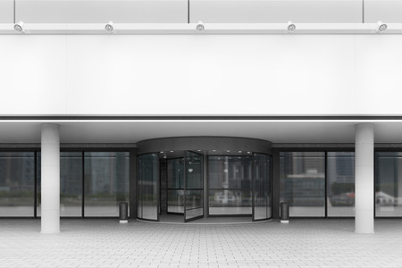 Front view of an entrance to the office building with white walls and glass doors. Concept of work...