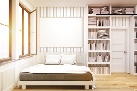 Home library with bookshelves by the sides of a door and a large bed. There is a horizontal poster hanging above it. 3d rendering. Mock up. Toned imageの写真素材