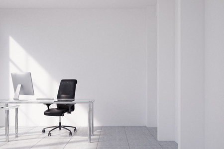 Minimalistic CEO office interior with white walls, concrete floor and a desk with computer on it. There is a leather armchair near the table. 3d rendering, mock upの写真素材