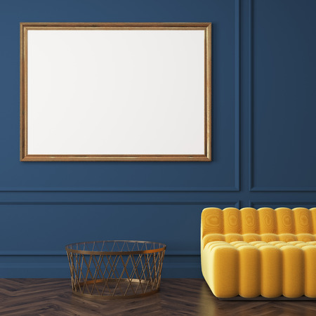Close up of horizontal poster standing on a dark wooden floor near a yellow sofa and a coffee table....