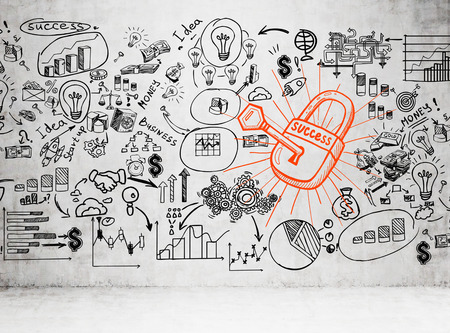 Black business scheme sketch and a red padlock with a key drawn on a concrete wall of an empty room.の写真素材