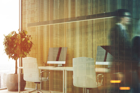 People in a wooden loft office interior with two computer monitors on a white desk, a tree and a panoramic window. 3d rendering mock up toned image double exposureの写真素材