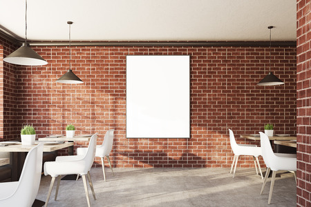 Brick cafe interior with square tables, white chairs and a vertical blank poster hanging on a wall. 3d rendering mock upの写真素材