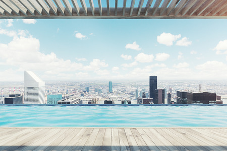 Modern cityscape on an ocean shore as seen from a pier with a wooden floor and ceiling. 3d rendering mock upの写真素材