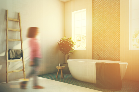 White and blue bathroom interior with a round white tub, two narrow windows, a tree in a pot and a ladder in a corner. Corner, a woman 3d rendering mock up toned image double exposureの写真素材