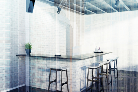 Corner of a brick upscale kitchen interior with a dark concrete floor and a bar stand with stools standing near it. 3d rendering mock up toned image double exposureの写真素材