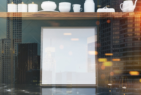 Black marble kitchen table with a framed square poster standing in a black wooden kitchen interior...