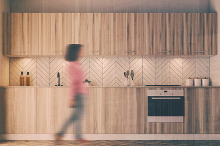 White wooden kitchen interior with wooden countertops with built in oven, sink, dishes on the surface. 3d rendering mock up double exposure toned image blurredの写真素材