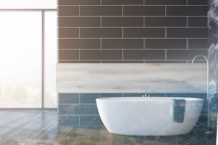 Black brick and wooden bathroom interior with a white bathtub standing next to a panoramic window. 3d rendering mock up double exposure toned imageの写真素材