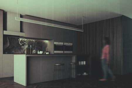 Dark gray kitchen interior with a gray bar, two stools, a window and two stoves. Side view. 3d rendering, mock up double exposure toned image blurの写真素材