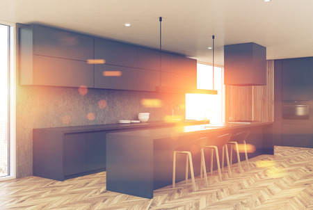 Modern white and wooden kitchen corner with a wooden floor, gray cupboards and countertops and an oven. 3d rendering mock up toned image double exposureの写真素材
