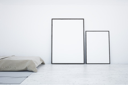 Luxury Scandinavian style bedroom interior with a master bed and two large vertical mock up posters standing on the floor next to it. 3d renderingの写真素材