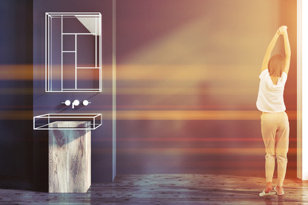 Futuristic bathroom interior with gray walls, a glass and wooden bathtub. A woman stratching. 3d rendering mock up toned imageの写真素材