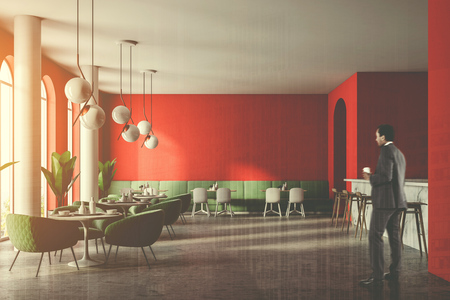 African American businessman in a green sofa luxury restaurant interior with red walls, large arched windows and columns. A bar on the right. 3d rendering mock up toned image double exposureの写真素材