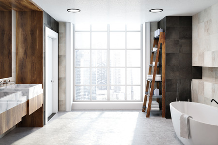 White tiles bathroom interior with a concrete floor, a large white bathtub and a closet with towels and bottles. A loft window. 3d rendering mock upの写真素材