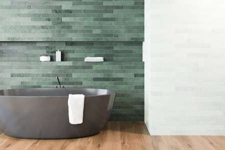 Luxury bathroom interior with emerald and white walls, a wooden floor, and a black bathtub. A close up. 3d rendering mock upの写真素材