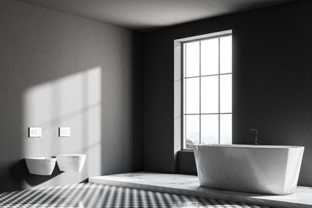 Gray luxury bathroom corner with a checkered floor, a white bathtub and two toilets. Loft window. 3d rendering mock upの写真素材