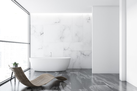 Loft white marble luxury bathroom interior with a gray marble floor, a white bathtub and a deck chair standing near the window. 3d rendering mock upの写真素材