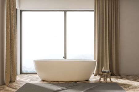 Elegant white bathtub standing on a wooden floor of a loft bathroom interior with beige curtains and a gray carpet. 3d renderingの写真素材