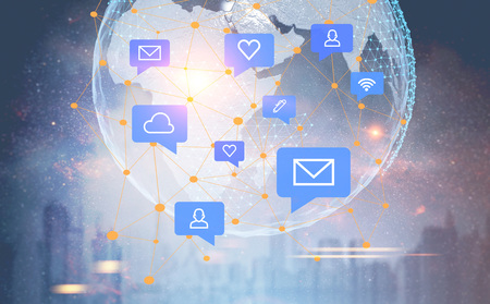 Internet email speech bubbles icons over night cityscape with Earth in sky. Hi tech innovation...