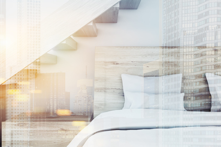 Scandinavian style bedroom interior with concrete walls, and a white double bed. A wooden staircase is above it. 3d rendering mock up toned image double exposureの写真素材