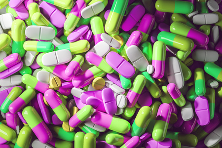 Glossy colourful pills lying on a flat surface. Top view. Concept of medicine, drug addiction and science. 3d rendering mock upの写真素材