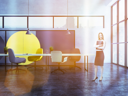 Blonde businesswoman standing in geometric wall pattern boardroom interior with concrete floor, narrow and panoramic windows, and long table with chairs. 3d rendering copy space toned imageの写真素材