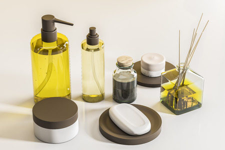 Transparent bottles with soap and spa products. Aroma sticks on white table. White wall background....