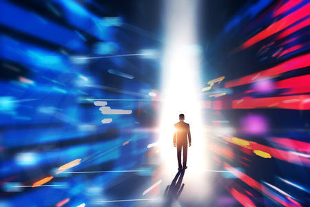 Rear view of a man in suit entering blue red vr tunnel. Concept of hi tech and immersive interface....