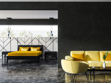 Black and white living room interior with soft yellow couch and armchairs near a coffee table and a...
