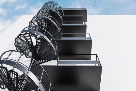 White house wall with gray spiral fire escape stairs. Concept of having an escape route in business and life. Low angle. 3d renderingの写真素材