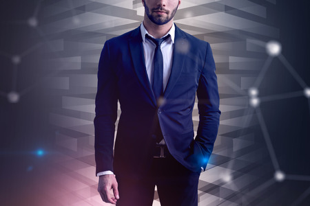 Businessman in black tie and suit standing over purple futuristic interface with graphs background. Network hologram. Toned image double exposureの写真素材