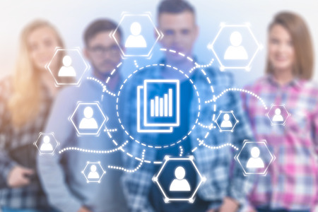 Young businessmen and businesswomen standing together with document management drawing in the...