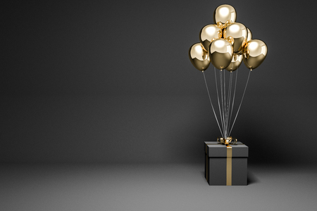 Black present box with gold ribbon and many gold balloons tied to it standing in empty black room. Concept of marketing and advertising. 3d rendering mock upの写真素材