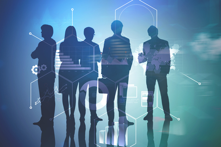 Silhouettes of business people over blurred blue background with infographics foreground. Toned image double exposureの写真素材