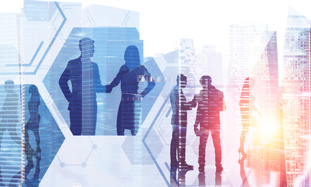 Silhouettes of business people working in morning city. Hexagonal pattern. Concept of business lifestyle. Toned image double exposureの写真素材