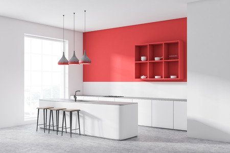 Corner of modern kitchen with red walls, concrete floor, shelves for dishes, white countertops with built in cooker and white bar with stools. 3d renderingの写真素材