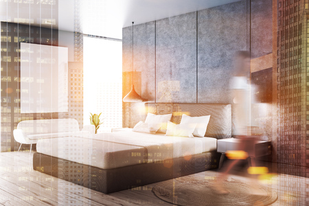 Woman in master bedroom interior with concrete and gray walls, wooden floor, gray master bed with white covers, bedside table and white sofa. Vertical poster. Toned image double exposure mock up blurの写真素材