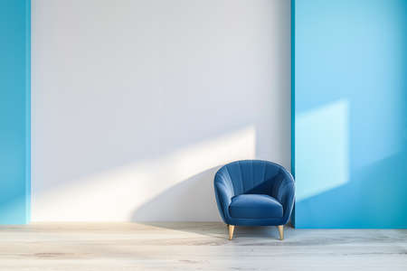 Interior of minimalistic living room with white and blue walls, wooden floor and comfortable blue armchair with wooden legs. 3d renderingの写真素材