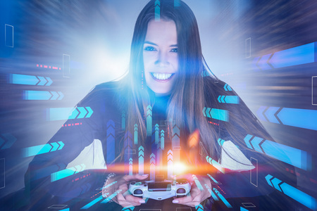 Smiling young woman with long hair sitting in armchair with gamepad. Double exposure of arrows....