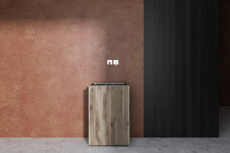 Interior of minimalistic bathroom with beige and dark wooden walls, concrete floor and steel and wooden sink. 3d renderingの写真素材