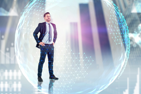 Confident businessman standing with hands on waist over blurred city background with planet hologram and infographics. Concept of global world. Toned image double exposureの写真素材
