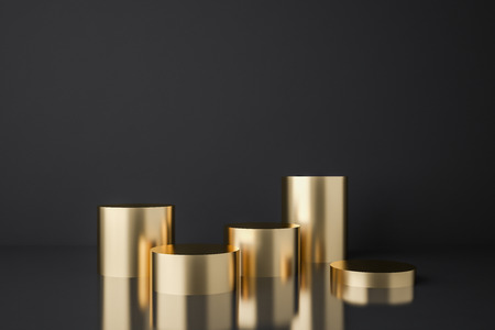 Gold empty product showcase podiums of different heights over black background. Concept of marketing and advertising. 3d rendering mock upの写真素材