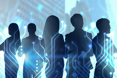 Silhouettes of business people over blurred city background with double exposure of circuit interface. Concept of hi tech in business. Toned imageの写真素材