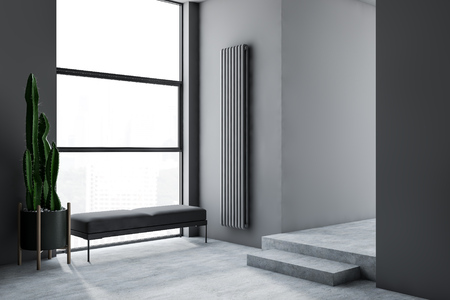 Interior of minimalistic living room with gray walls, concrete floor, gray bench standing near large window with cityscape and plant in pot. 3d renderingの写真素材